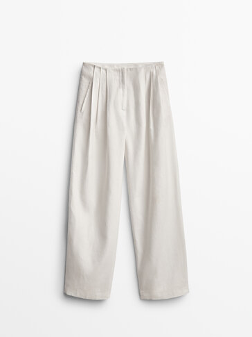 Pantaloni a vita bassa di lino e cotone