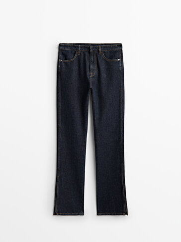 Inntilsittende jeans med splitter