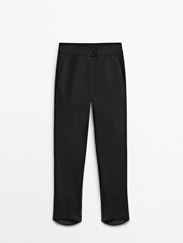 Black cropped trousers with uneven hems