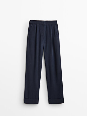 Full length trousers with turn-up hems