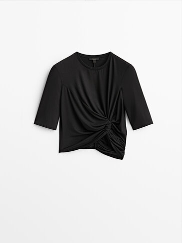 Zwart T-shirt met geknoopt detail