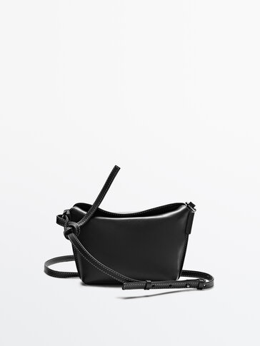 Leather crossbody bag with seam details