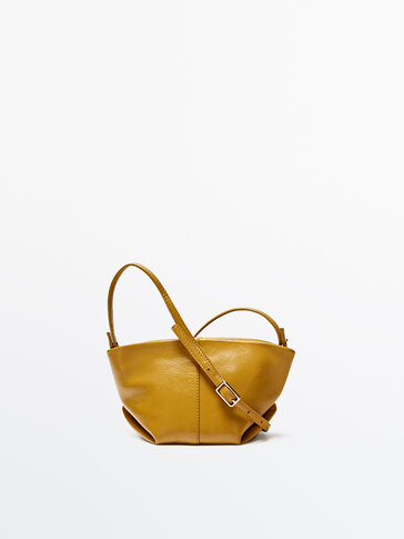 Mini leather crossbody and pouch trapeze bag
