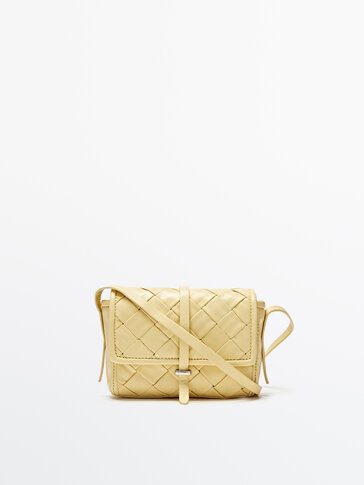 Braided leather crossbody bag with flap