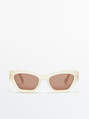 Sonnenbrille mit cremefarbenem Kunststoffgestell