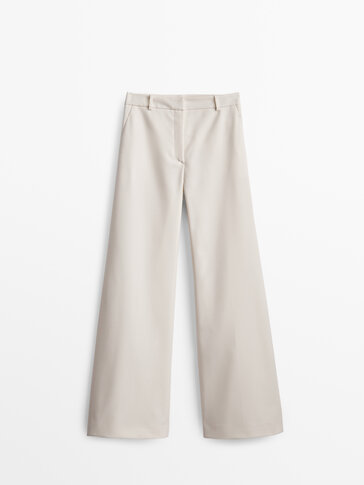 Spodnie od garnituru o rozszerzanym kroju − Studio