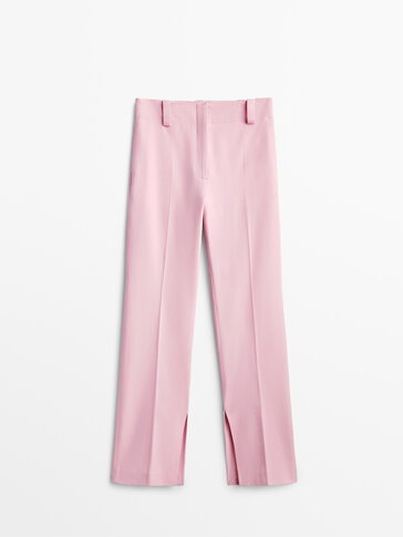 Różowe wełniane spodnie z rozcięciami − Studio