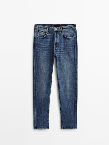 Stone wash tapered fit jean