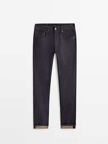 Pantalón tejano dirty brushed tapered fit