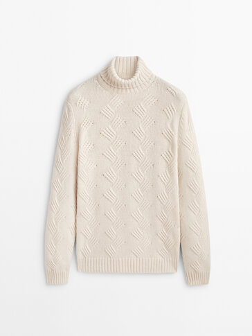 High neck sweater with oblique knit detail