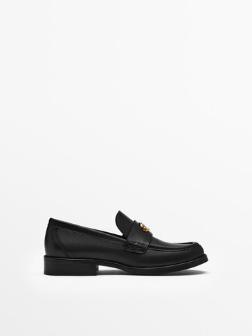LEATHER LOAFERS WITH METAL APPLIQUÉ