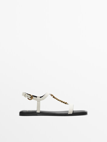 Flat leather sandals with chain -Studio