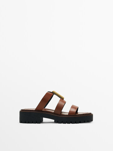 Leather sandals with track soles