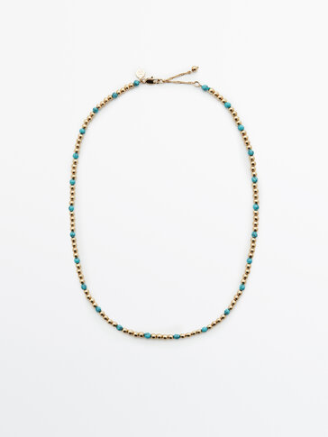 Gold-plated necklace with blue beads