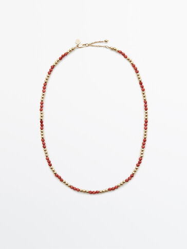 Gold-plated necklace with red beads