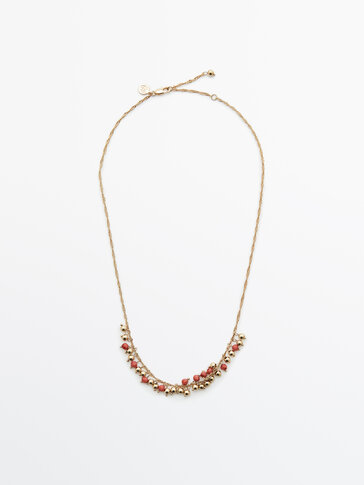 Gold-plated chain necklace with red beads
