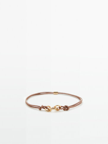 Leather cord bracelet with metal ring
