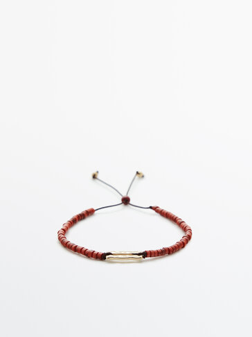 Cord bracelet with coloured stones
