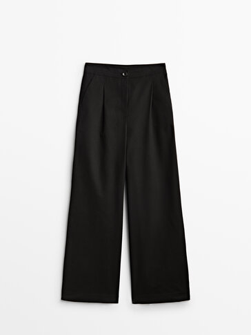 Darted trousers with embroidered waist
