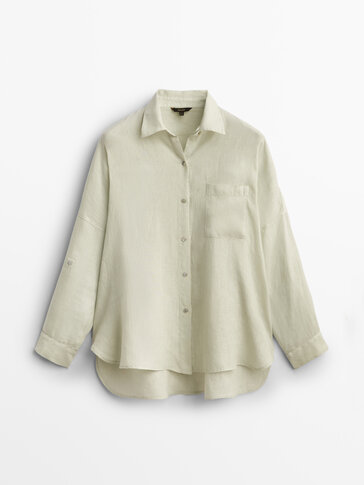 Linen shirt with rolled-up sleeves