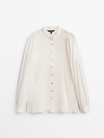 Oversize blouse with stand-up collar and back detail