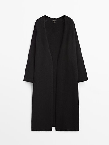 Ilgas juodos spalvos trikotažinis paltas
