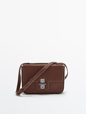 Leather crossbody bag with metal clasp