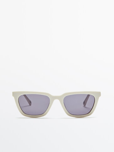 Sonnenbrille mit cremefarbenem Kunststoffgestell