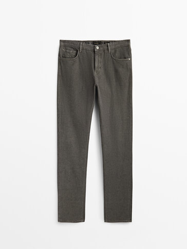 Slim-fit textured denim-effect trousers