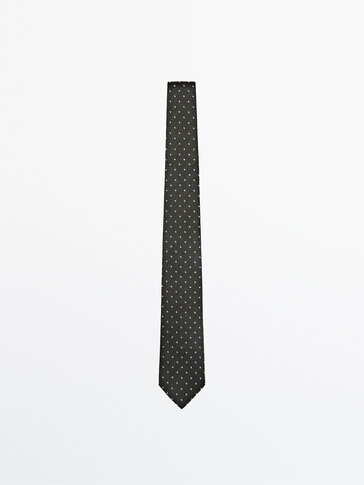 Dobbelt, polkaprikket slips i 100% silke
