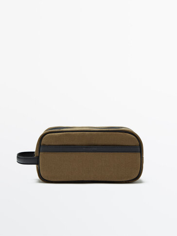 Contrasting toiletry bag with leather details