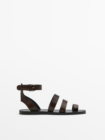 LEATHER FLAT CROSSOVER SANDALS
