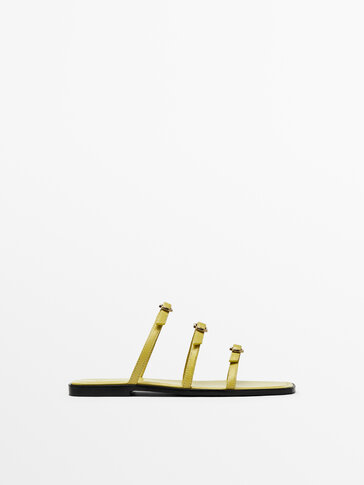 Flat leather sandals with three straps