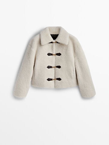 Short curly mouton coat with lobster clasps