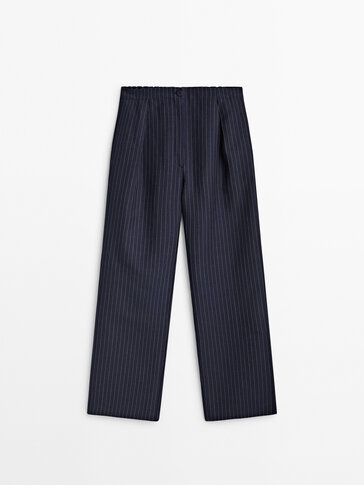 Striped trousers with elasticated waistband and darts