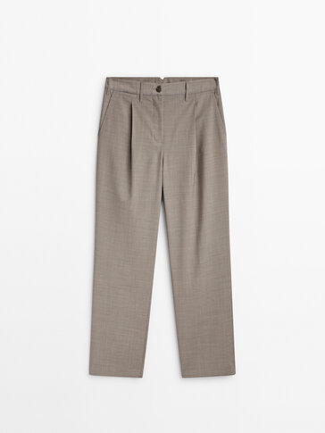 Darted trousers with buttoned tab at the back
