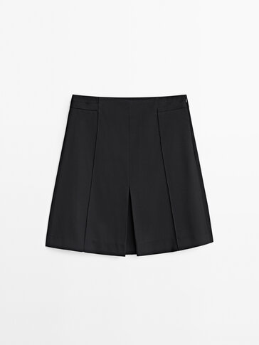 Mini skirt with pleated detail