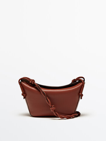 Leather crossbody bag with woven strap