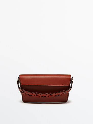 Leather crossbody bag with interwoven strap