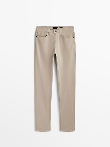 Tapered fit textured denim trousers
