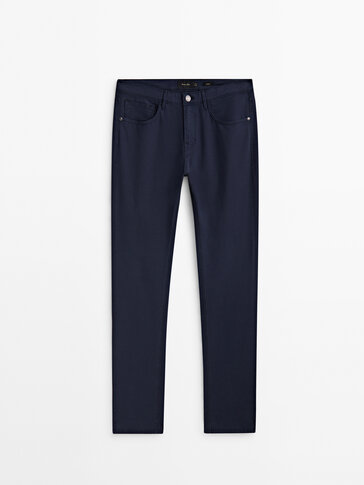 Slim-fit textured denim-effect trousers