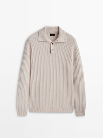 Ribbed knit sweater with mock neck and buttons