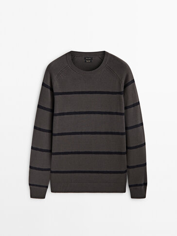 Knit sweater with crew neck and irregular stripes