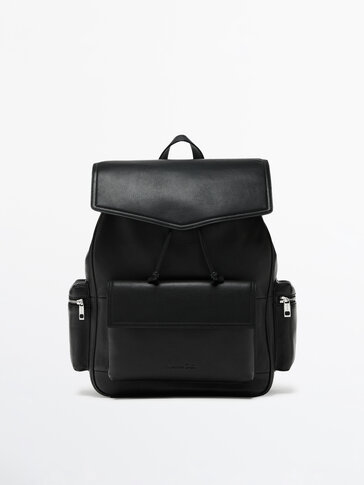 Black leather backpack with flap and pocket details