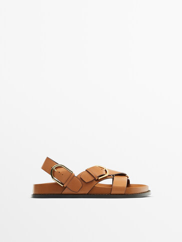Criss cross sandals with buckles Tan Flat Sandals Massimo Dutti