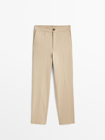 Slim fit trousers with central seam