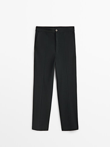 Slim fit trousers with central seam