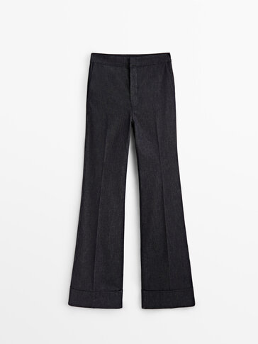 Flared high-waist jeans with turn-up hems