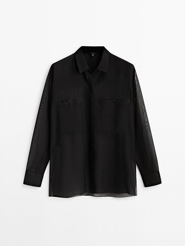 Camisa negra semi transparente bolsillos