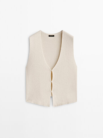 V-neck knit vest with opening details